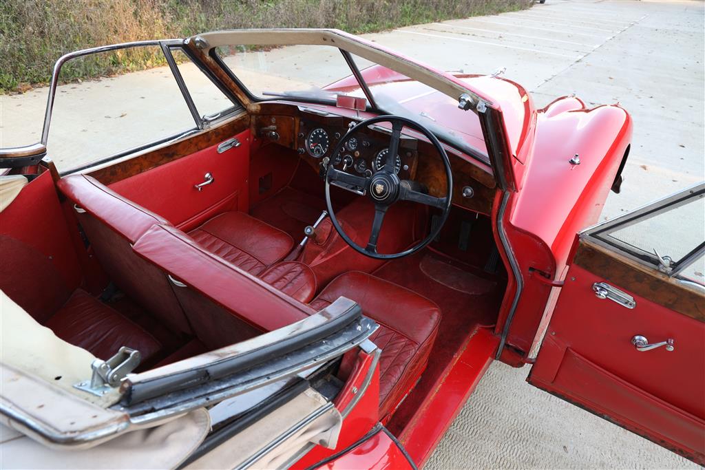 A 1955 Jaguar XK140 DHC